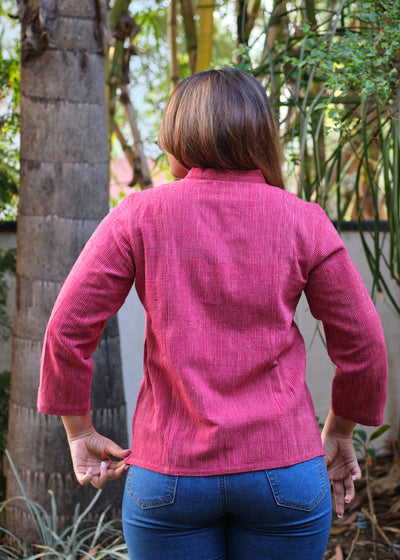 woman in a red shirt back side view